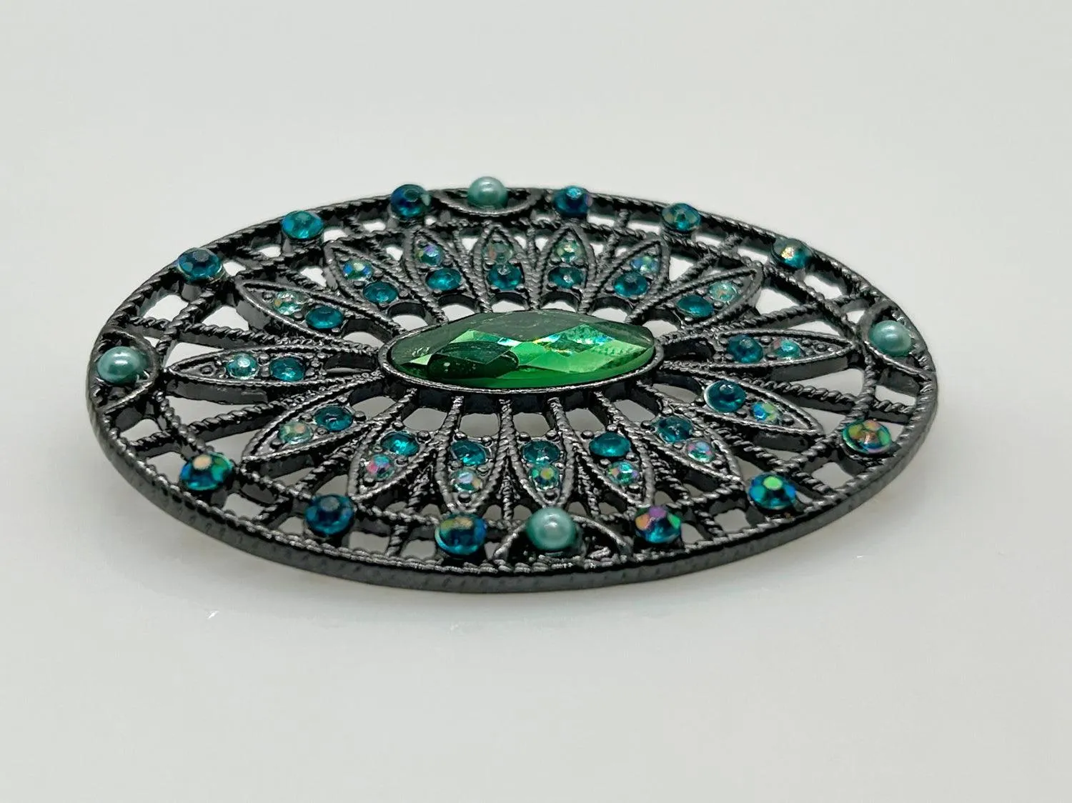 Green and Blue Rhinestone Edwardian Style Brooch in Blackened Frame