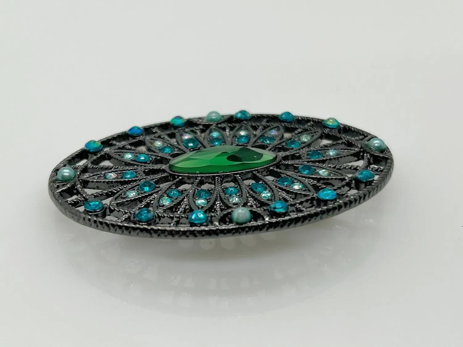 Green and Blue Rhinestone Edwardian Style Brooch in Blackened Frame