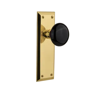 New York Long Plate with Black Porcelain Knob in Unlacquered Brass